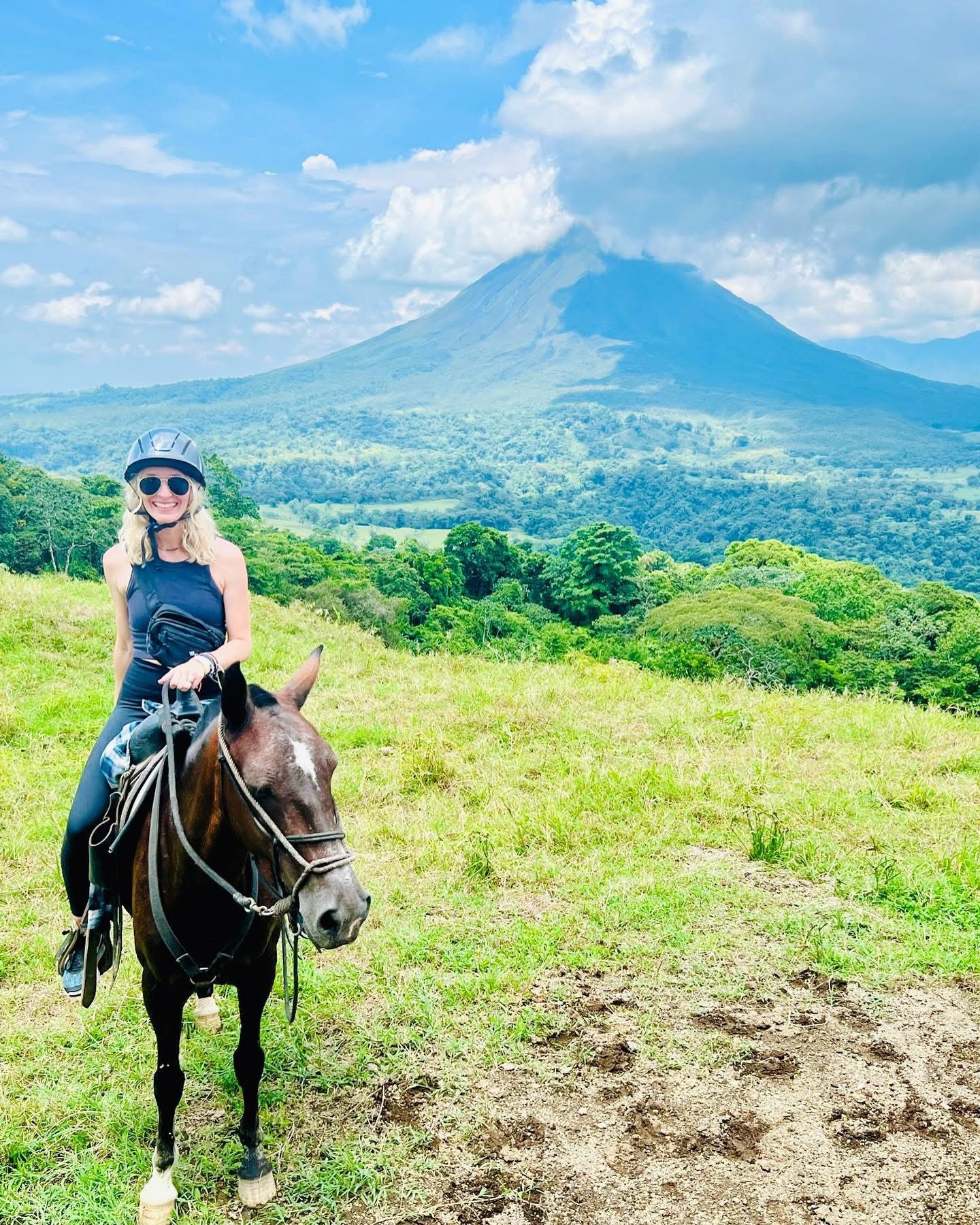 Nicole on horseback in front of Arenal Volcano, Costa Rica