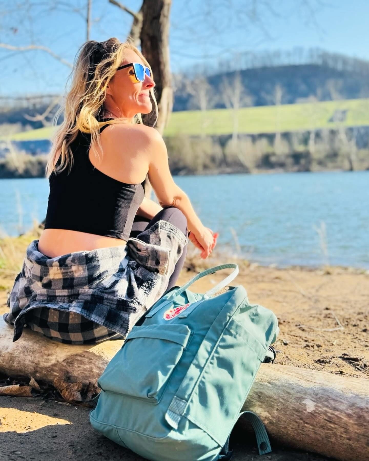 Nicole sitting by the New River in West Virginia